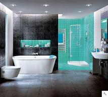 Fully Tiled and Plastered blue magic Bathroom by GM Plastering & Tiling Manchester